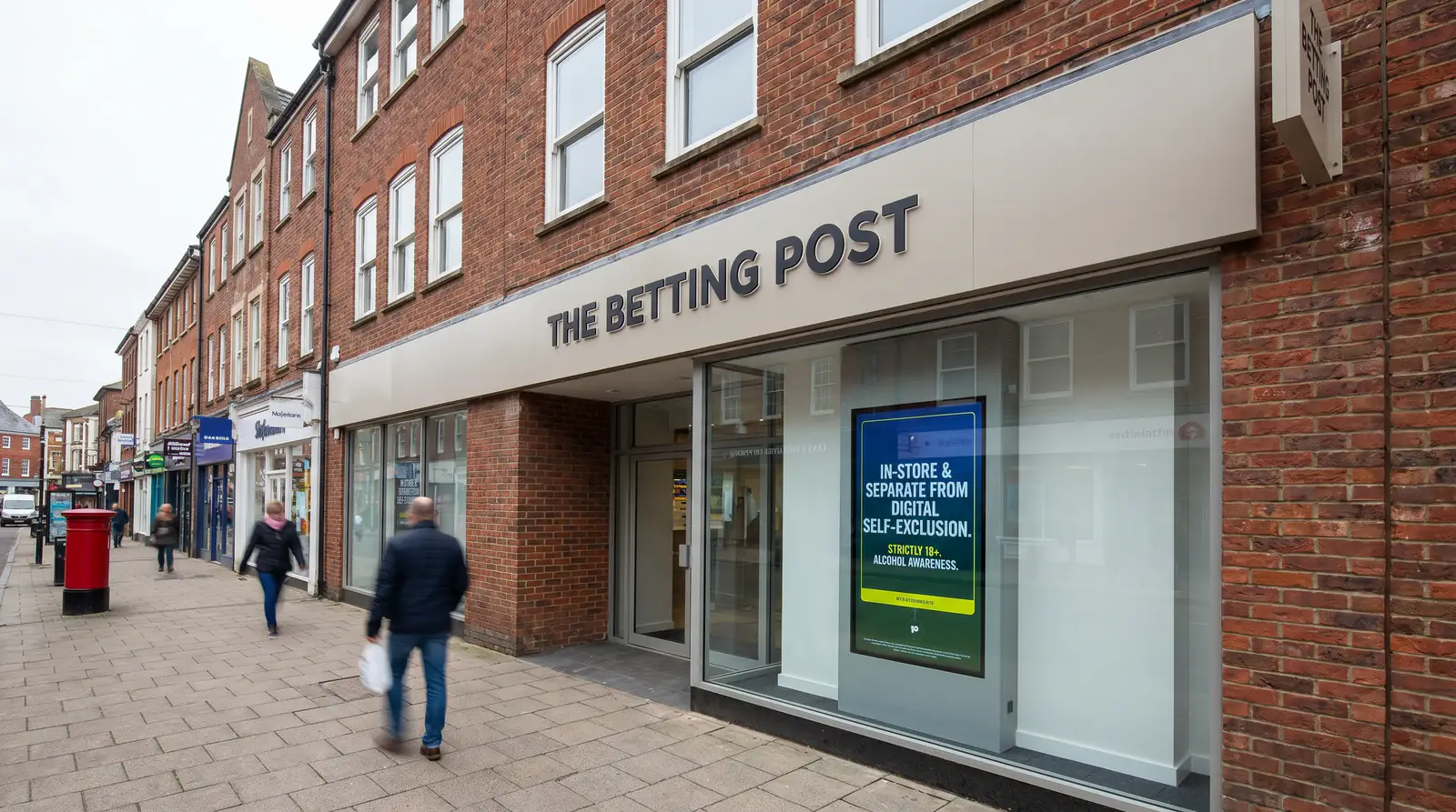 UK high street betting shop exterior showing it is separate from online exclusion