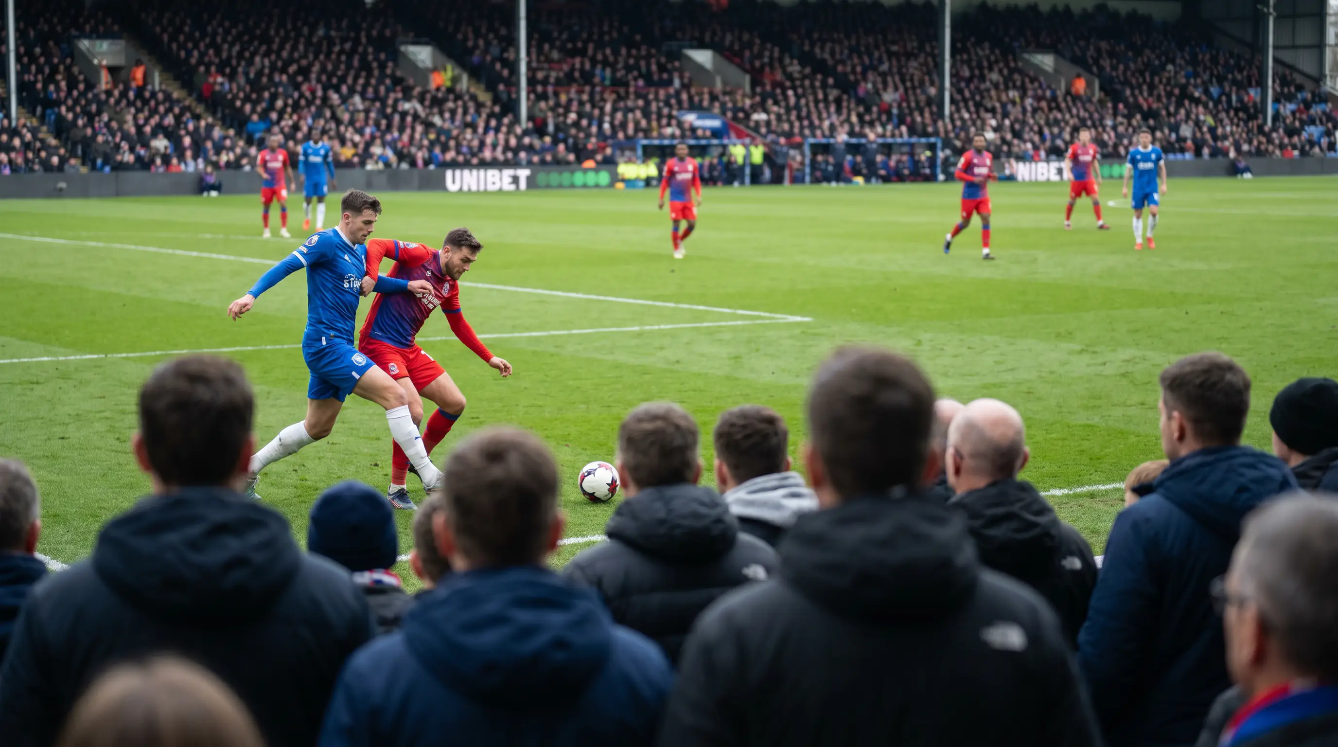Close-up of a single Premier League match in progress from the stands